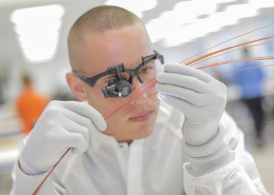 Technician inspects tubes